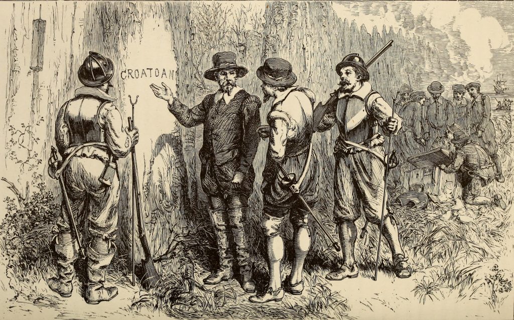 Men looking at a tree with "CROATOAN" carved into it